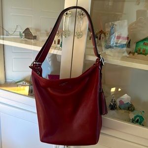 Vintage COACH RED Legacy Bucket in very good condition.Pics show small blemishes